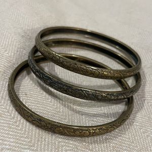 Antique gold and silver bangles.